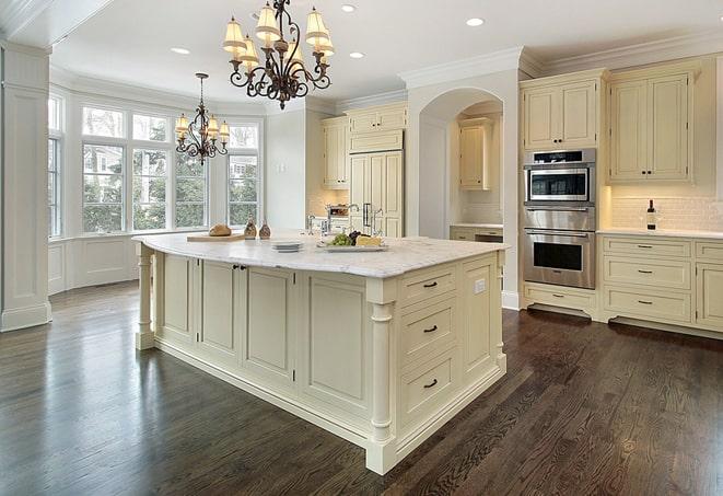 professional installation of laminate flooring in a home renovation in Carle Place